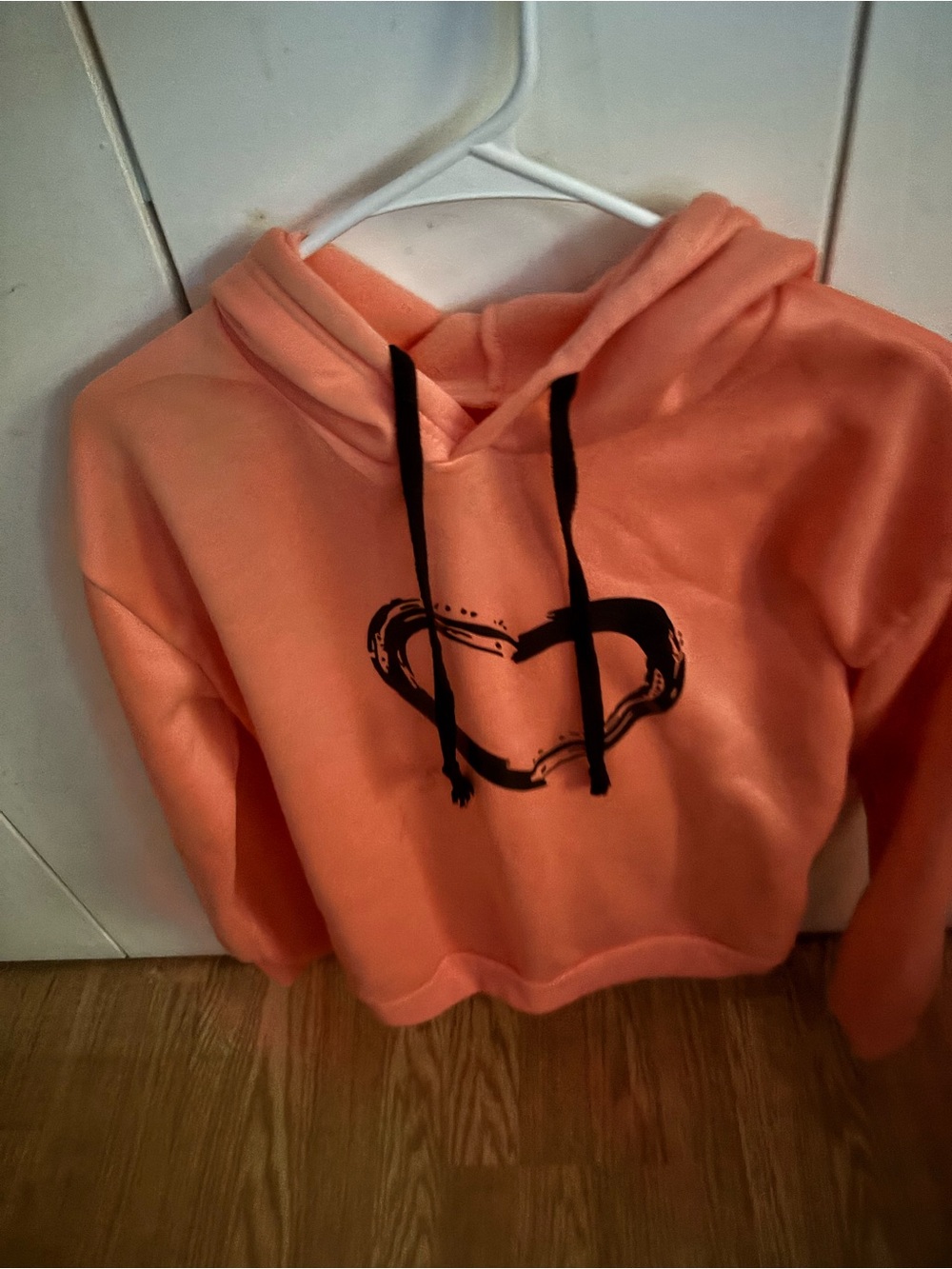 Coral Hoodie with Black Heart Graphic